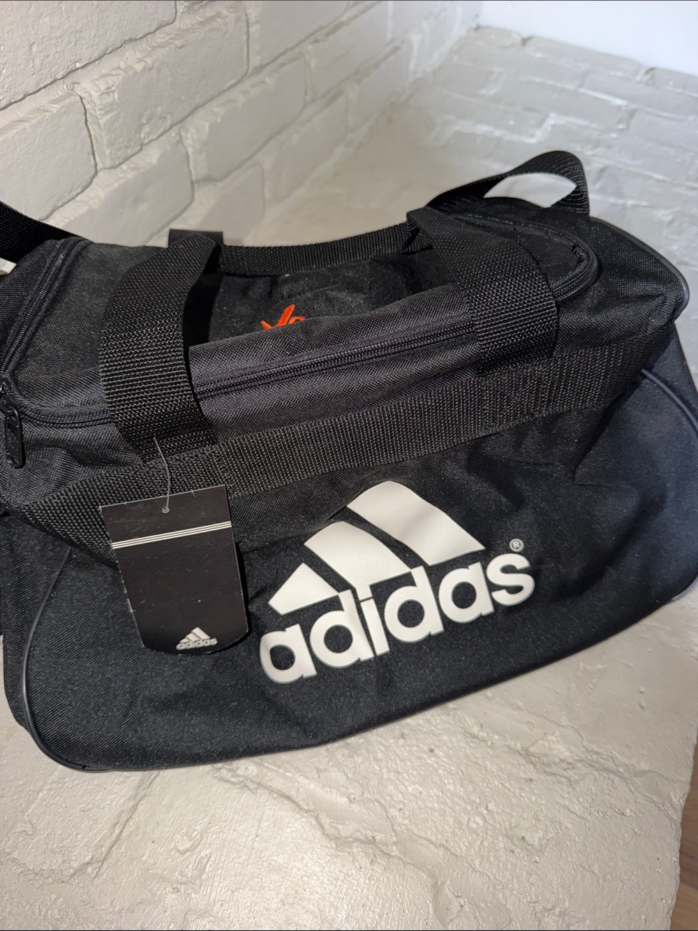 Small light weight Adidas duffel bag. Monogrammed to X games Los Angeles